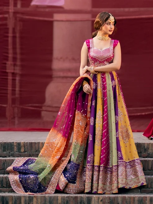 Bin Ilyas pakistani fashion outfit with coordinated formal styling.